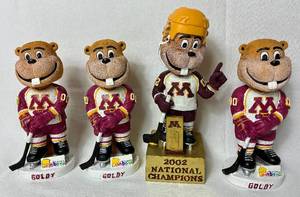 lot 131 image: Minnesota Golden Gophers Hockey Bobbleheads including 2002 National Champion Bobblehead