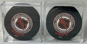 lot 159 image: Phoenix Coyotes Rick Tocchet #22 Autographed Hockey Pucks 2000