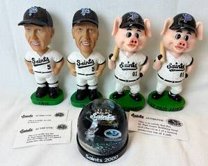 lot 123 image: St Paul Saints Bobbling Head Dolls -Bacon (Saints Pig), Terwilliger and 2000 Saints Snow Globe