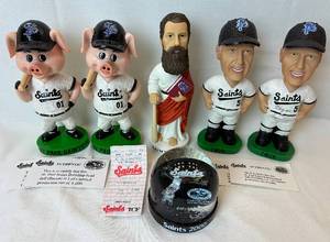 lot 122 image: St Paul Saints Bobbling Head Dolls -Bacon (Saints Pig), Saint Paul, Terwilliger and 2000 Saints Snow Globe