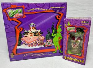 lot 42 image: Department 56 Dr Seuss How the Grinch Stole Christmas Farfingles Department Store and The Grinch Bobblehead