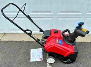 lot 184 image: Toro Power Clear Snowblower 180 87CC 4 Cycle OHJ 18 Width Model #38282, Serial #311012314