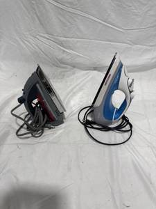 lot 0238 image: Two Electric Steam Irons