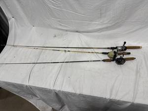 lot 0277 image: Three Fishing Rods with Reels