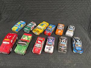 lot 0302 image: Collection of Car Tins