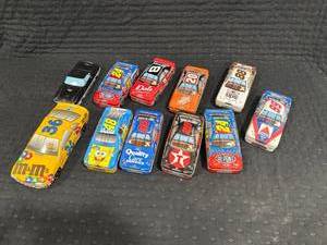lot 0303 image: Tin Toy Race Cars