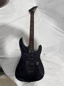 lot 0341 image: Black Charvel Electric Guitar