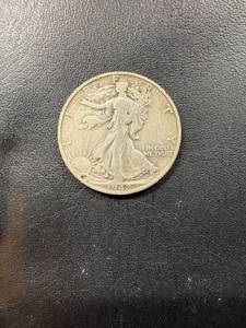 lot 0438 image: 1942 S Walking Liberty Half Dollar