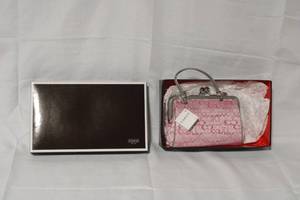 lot 11 image: Coach Pink Signature Wristlet Frame Purse Set with Box and Tags