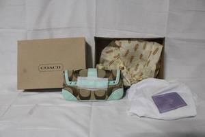 lot 16 image: Coach Signature Khaki and Aqua Convertible Flap Purse with Box and Dust Bag