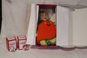 lot 32 image: Pumpkin Costume Porcelain Doll with 2 Red Hat Collection Figurines