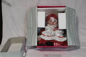 lot 35 image: Porcelain Holiday Clown Doll with Certificate in Original Box