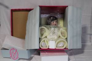 lot 37 image: Madame Alexander Porcelain Doll in Original Box with Certificate of Authenticity