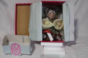 lot 48 image: Marie Osmond Fine Collectibles Christmas Cookie Doll with Box and Certificate