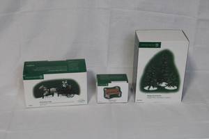 lot 69 image: Department 56 Heritage Village Accessories Lot, Red Christmas Sled, Wooden Park Bench, Sisal Pine Trees