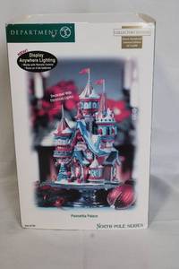 lot A-86 image: Department 56 North Pole Series Collectors Edition Poinsettia Palace with Christmas Lights