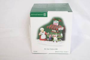 lot 90 image: Department 56 North Pole Series Mrs. Claus Cookies & Milk Figurine