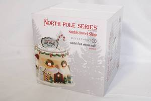 lot 91 image: Department 56 North Pole Series Santas Hot Cocoa Cafe Porcelain Building