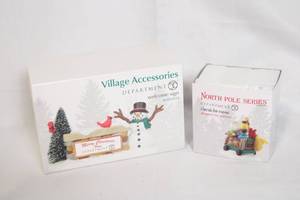 lot 94 image: Department 56 Village Accessories Welcome Sign and North Pole Series I Break for Cocoa Figurines