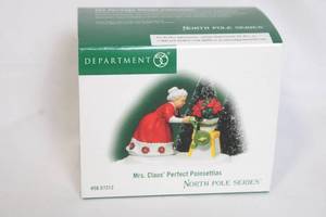 lot 97 image: Department 56 Mrs. Claus Perfect Poinsettias North Pole Series Figurine