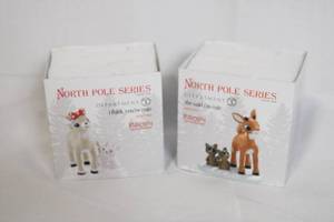lot 99 image: Department 56 North Pole Series Rudolph She Said Im Cute and I Think Youre Cute Figurines in Boxes