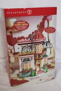 lot 108 image: Department 56 Snow Village Cupids Cardshop with Cordless Lighting
