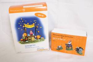 lot 134 image: Department 56 Halloween Village Caramel Apple Stand and Dog Accessories Set