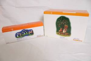 lot 149 image: Department 56 Snow Village Halloween Decorations - Creative Carvings and Halloween Kids Set