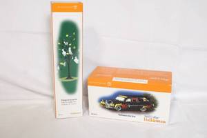 lot 153 image: Department 56 Snow Village Halloween Hot Rod and Bats & Spooks Tree Accessories