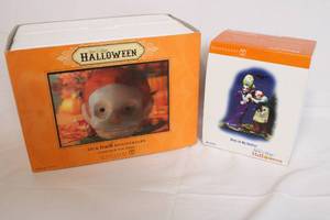 lot 157 image: Department 56 Snow Village Halloween 10th Anniversary Set with Bats In My Belfry Figurine