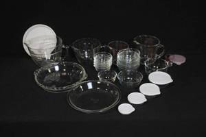 lot 178 image: Collection of Pampered Chef Glass Mixing Bowls, Pie Plates, and Storage Lids