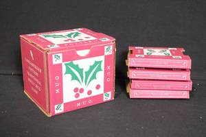 lot 213 image: Longaberger Pottery Holly Mug with Set of 4 Matching Coasters