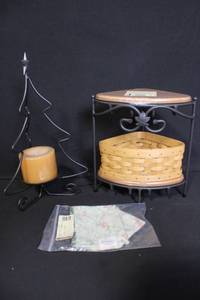 lot 231 image: Longaberger Holiday Group with Tree Candle Holder, Vanilla Hazelnut Candle, Corner Basket and Liner