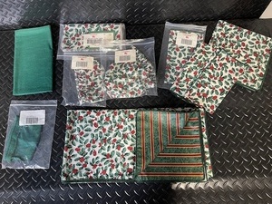 lot 286 image: Holiday and Seasonal Linen Set Including Longaberger Hollyberry Napkins, Placemats, and Table Runners
