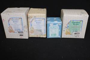 lot 344 image: Set of 4 Cherished Teddies Collectible Figurines and 1 Noahs Ark Goats Figurine in Original Boxes