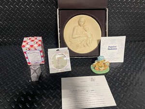 lot 466 image: Collection of Enesco Figurines, Cherished Teddies, and Madonna Plaque