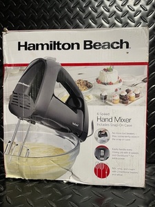 lot 324 image: Hamilton Beach 6-Speed Hand Mixer with Snap-On Case