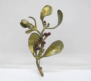lot 53 image: Large Signed Mistletoe Brooch wGarnets