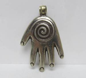 lot 60 image: Large Vintage Moroccan Ornate Metalwork Hand Pendant