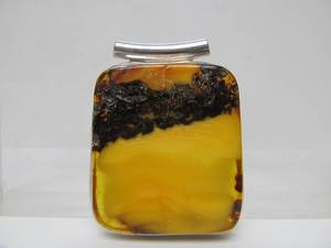lot 69 image: Large Sterling Silver & Amber Pendant