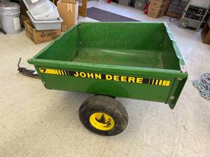 lot 2 image: John Deere Tilt Cart Model 7