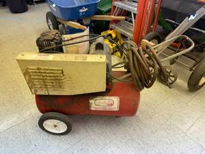 lot 7 image: Red and White Air Compressor