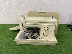 lot 141 image: Kenmore Sewing Machine