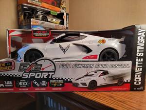 lot 258 image: New Bright Corvette Stringray RC Remote Control Car, NIB