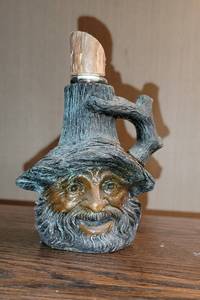 lot 322 image: Folk Art Tree Elf Liquor Bottle