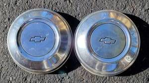 lot 404 image: Vintage Chevy Hubcap Pair
