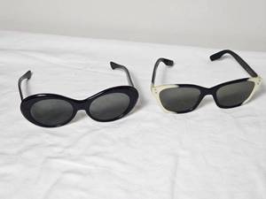 lot 93 image: American Optical True Color CN80 Sunglasses  BlackIvory Fade