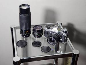 lot 279 image: Canon AE-1 Program 35mm SLR Film Camera with 3 Lenses  28mm, 50mm, and 75300mm Vivitar Zoom