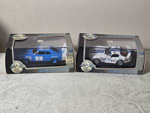 lot 208 image: Die Cast Model Cars - 143 - Eagles Race - Dodge Charger Daytona 88 (1969)  Dodge Viper GTS-R 51 (1996)