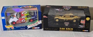 lot 162 image: NASCAR Die Cast Model Cars - 124 24K GOLD PLATED - Hot Wheels  Racing Champions - Zerex Ford Taurus Roush #6 Mark Martin (1999) - Reflections in Gold Valvoline Ford Taurus Roush #6 Mark Martin (1998)